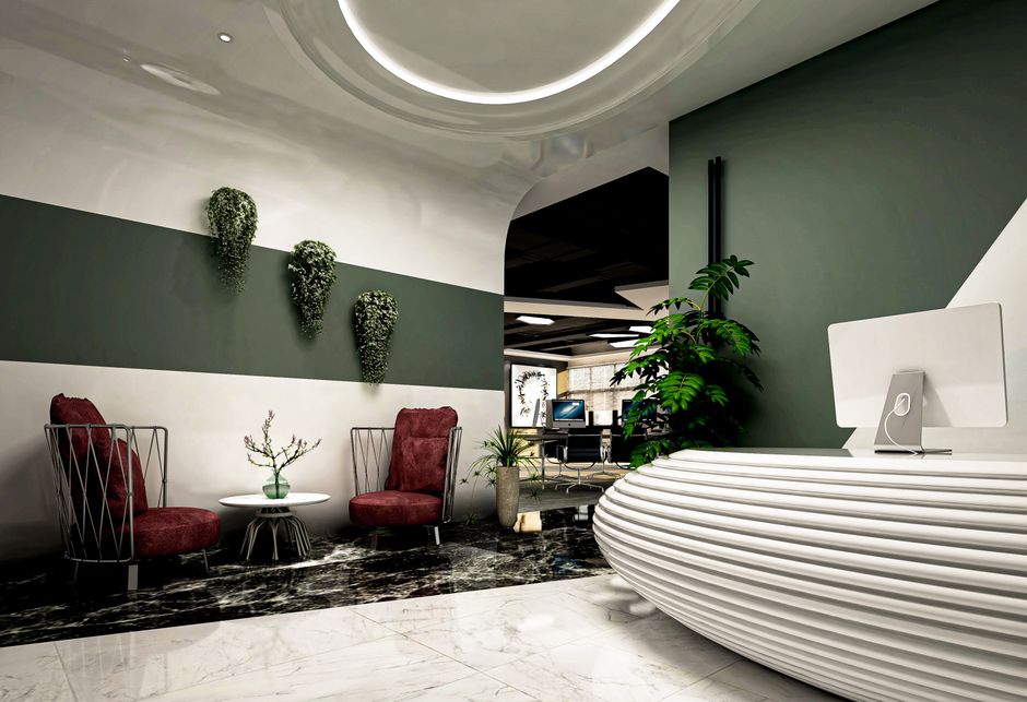 Modern office interior with burgundy accent chairs and greenery