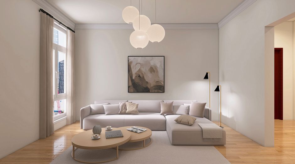 Elegant minimalist living room in soft neutral tones with contemporary furniture